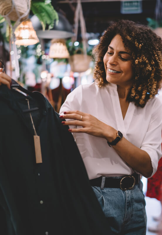 a woman shopping for clothes