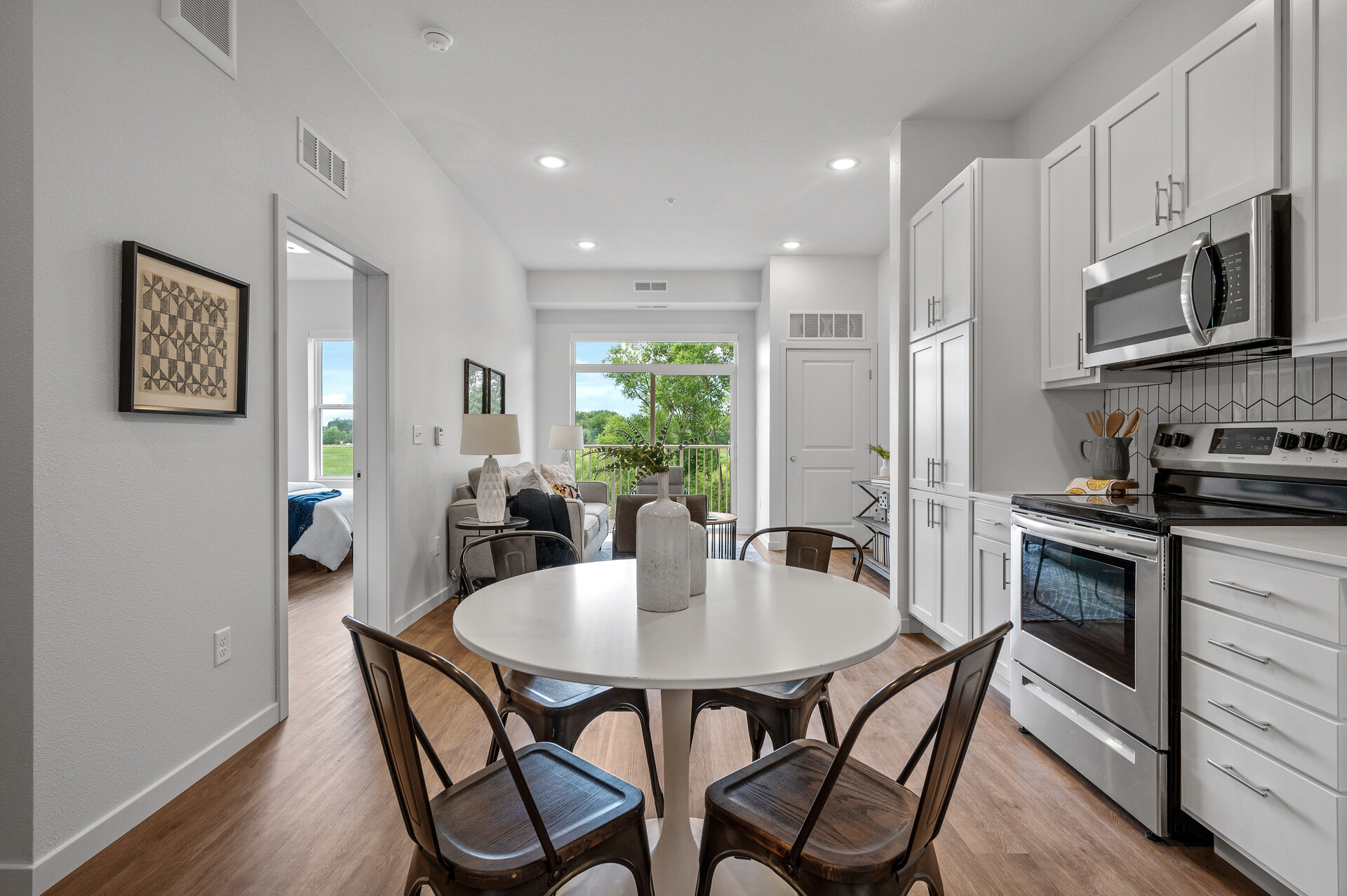 a photo of the kitchen and living room